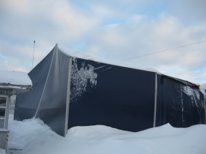 Destroyed aluminum tent building